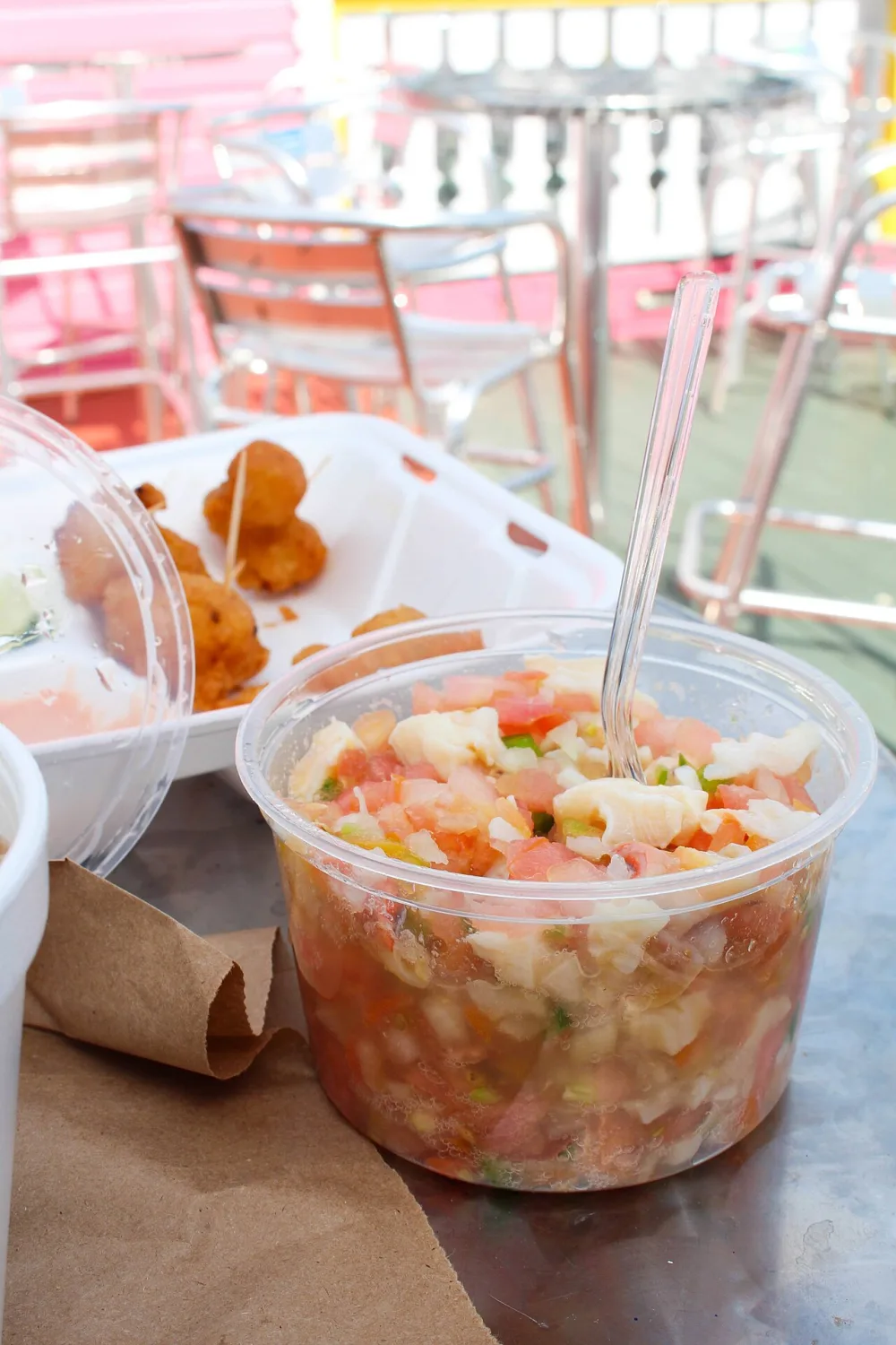 Fresh Bahamian conch salad with tomatoes, onions, peppers and lime