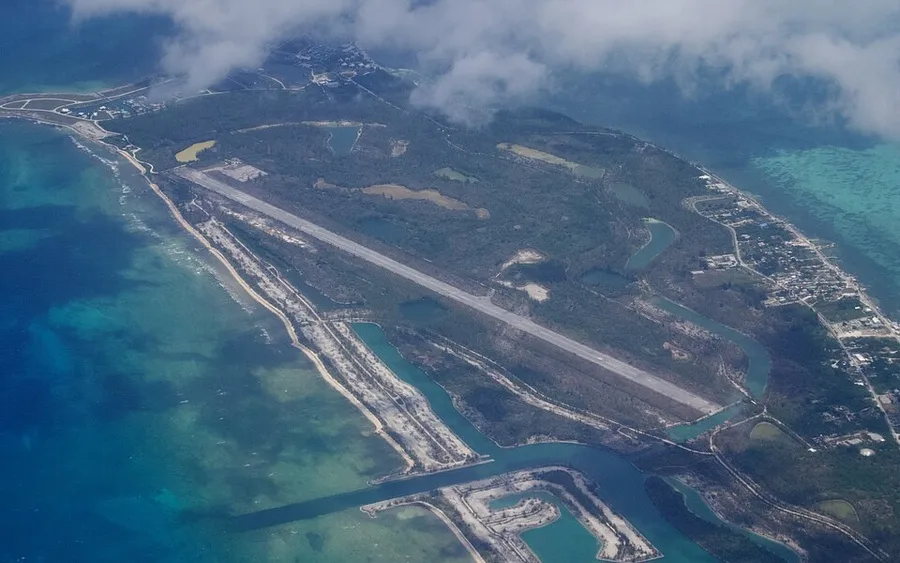 Aerial view of the West End tip of Grand Bahama with its marina canals and reef flats