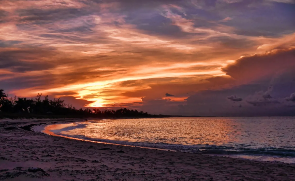 Calm Eleuthera shoreline at golden hour near Preacher's Cave