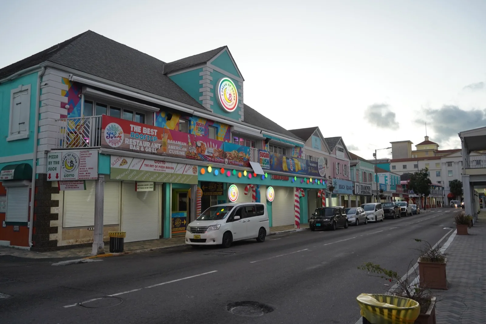 Downtown Nassau Bay Street with colonial pastel buildings and shops
